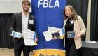 Vasco Bernardes and Madisyn McIntosh hold LTC's awards at the FBLA Leadership Conference