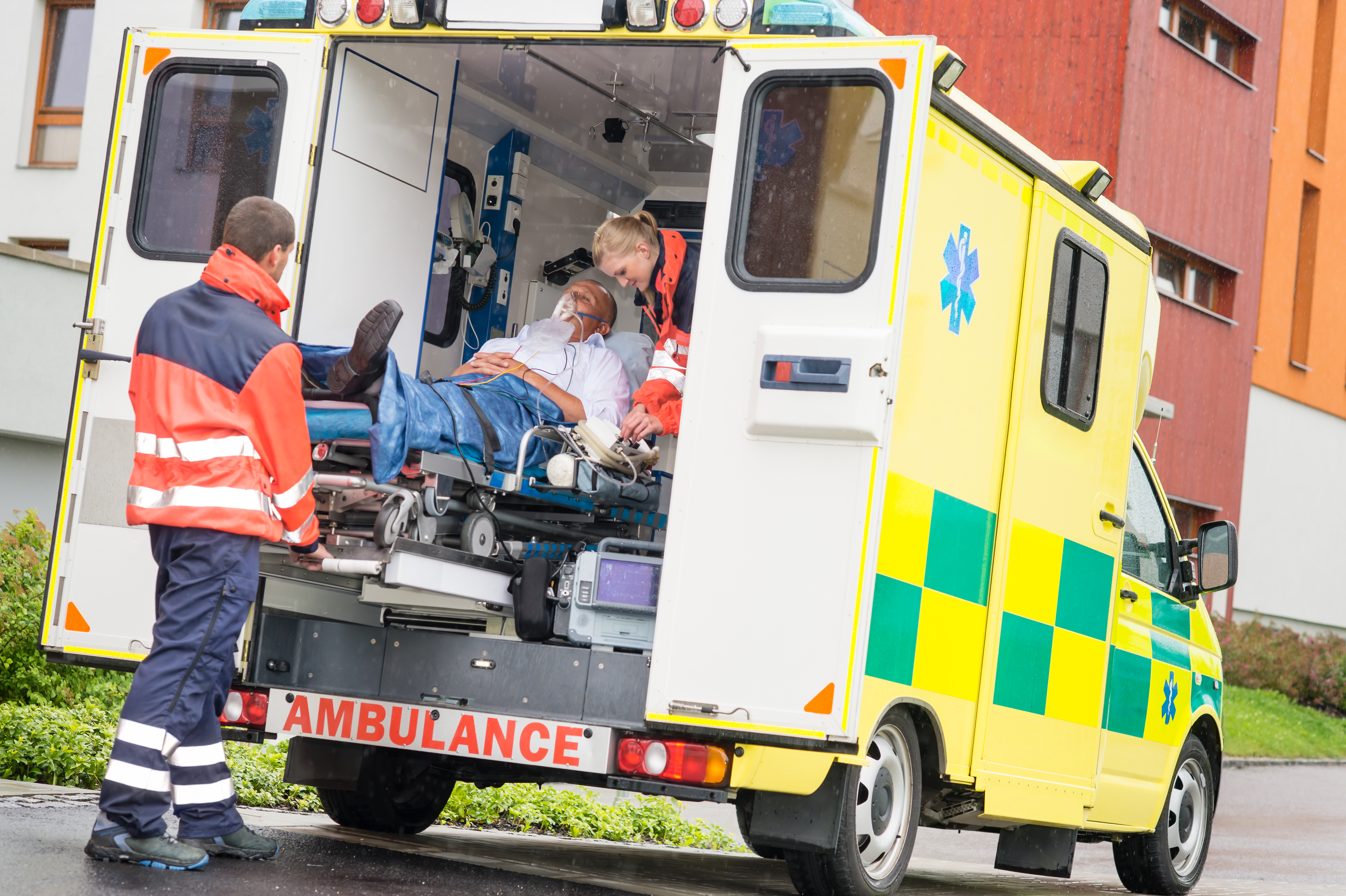 Ambulance loading a patient