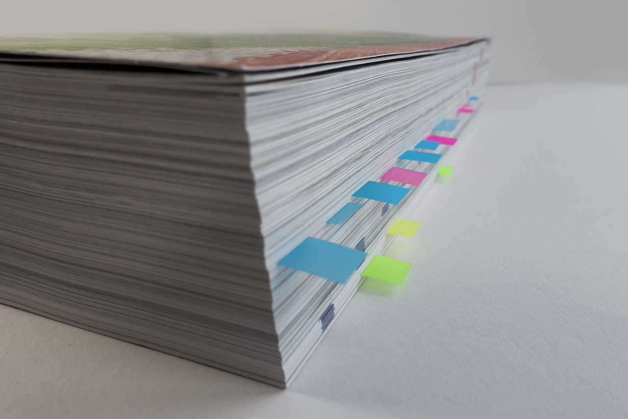 Catalogue with sticky note tabs