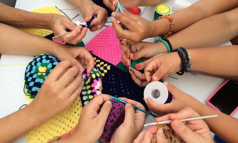 People doing crochet