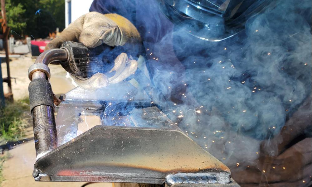 Photo of Student Welding