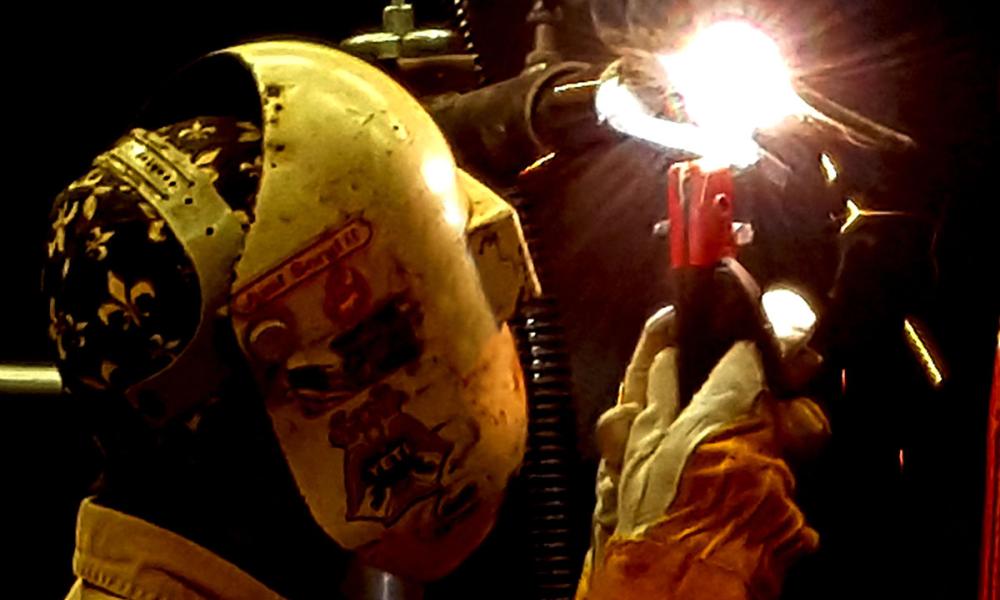 Photo of Student Welding