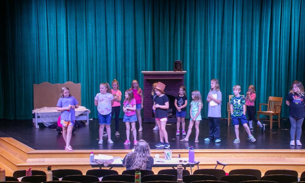 Children in Lincoln Trail College's Children's Summer Theater production of Roald Dahl's Willy Wonka KIDS rehearse a scene