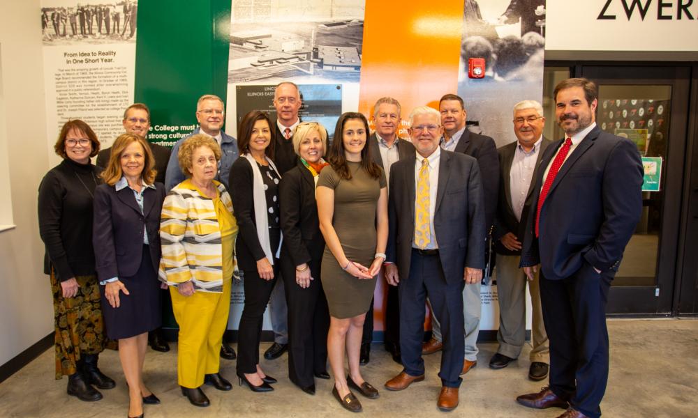 Guadalupe Amicone is surrounded by IECC Trustees and Presidents celebrating her final meeting