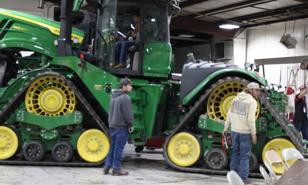 Large green tractor sits in the Diesel Technology Program area for Diesel Day 2024