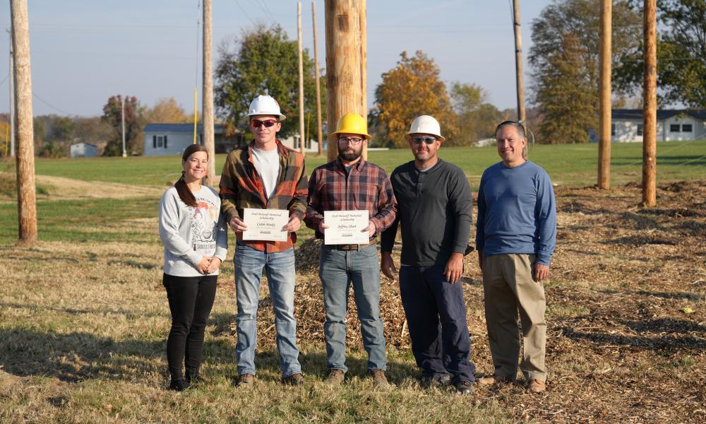 Academic Advisor Kara Blanton, Caleb Hardy, Jeffrey Short, EDS Instructor Dustin Wiggins, and Chief Academic Officer & Dean of Instruction Paul Bruinsma; Photo is of Earl Pottorff Memorial Scholarship Recipients.