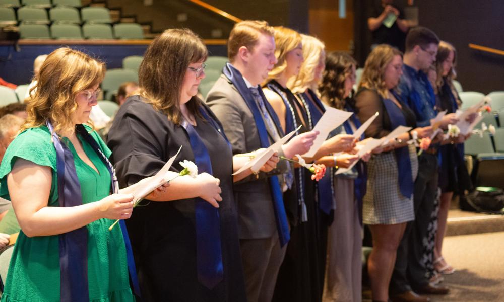 Members of Lincoln Trail College's Nursing Class of 2025 recite the Florence Nightingale Pledge