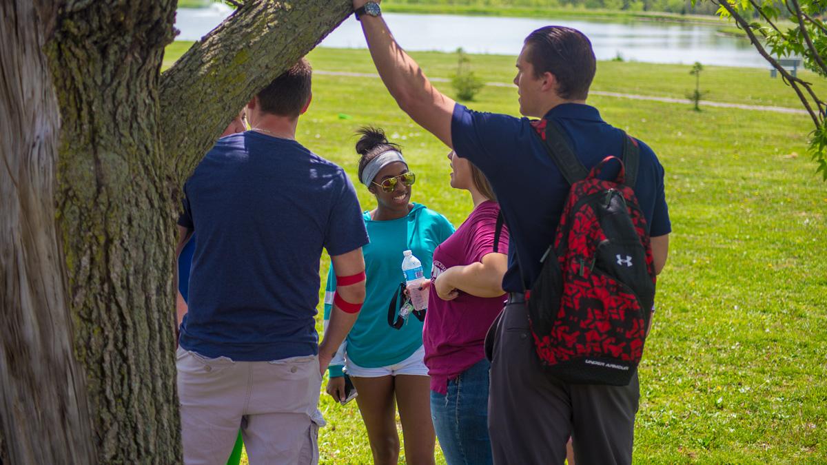 Students talking at Miller Lake