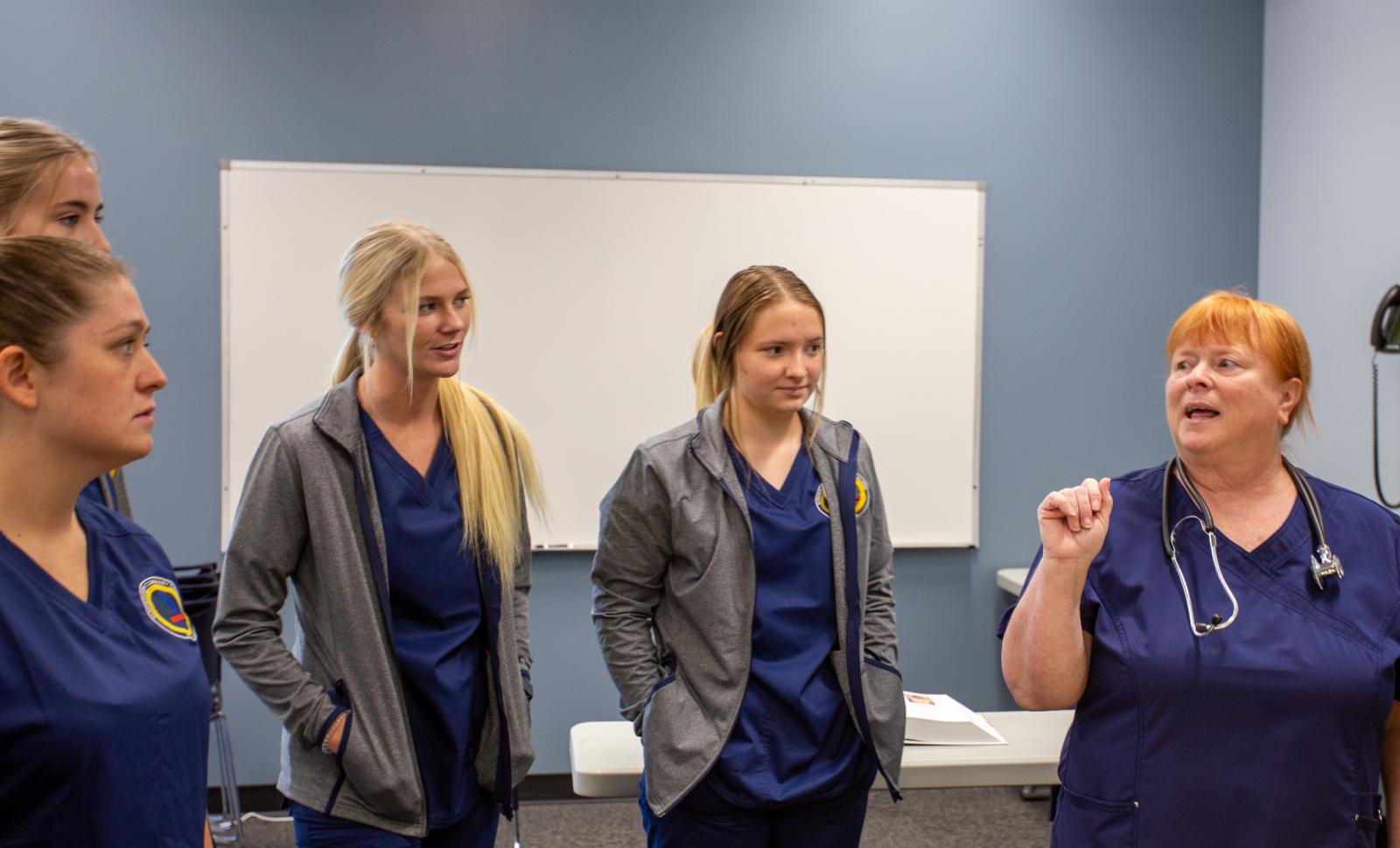 Lincoln Trail College nursing instructor Pauletta Gullett leads a class with nursing students