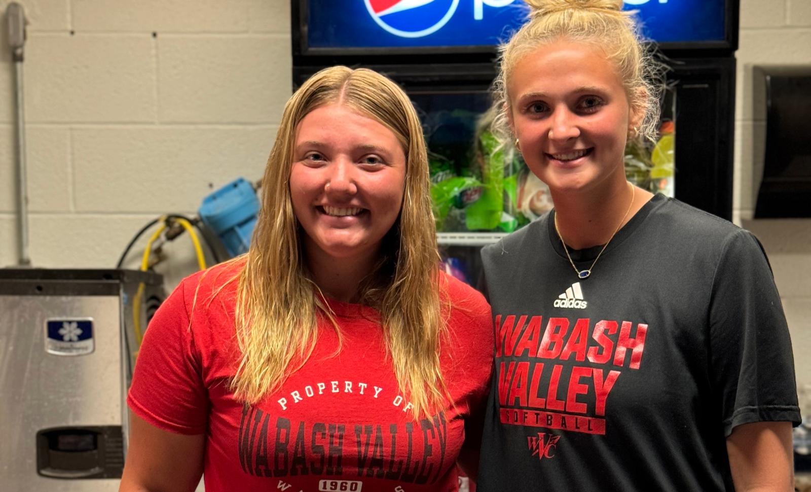 Students posing for photos in WVC shirts