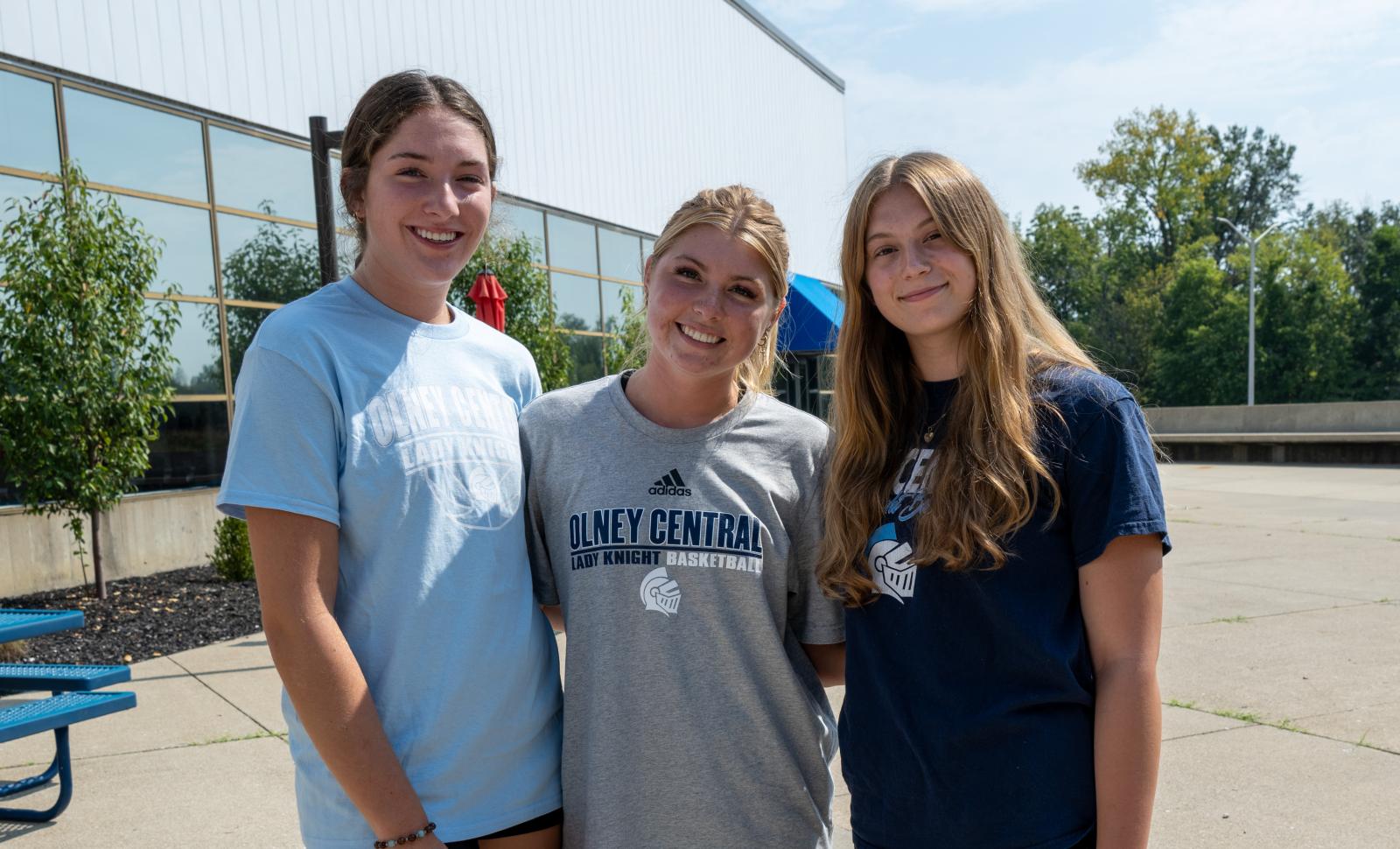 Students standing on the patio