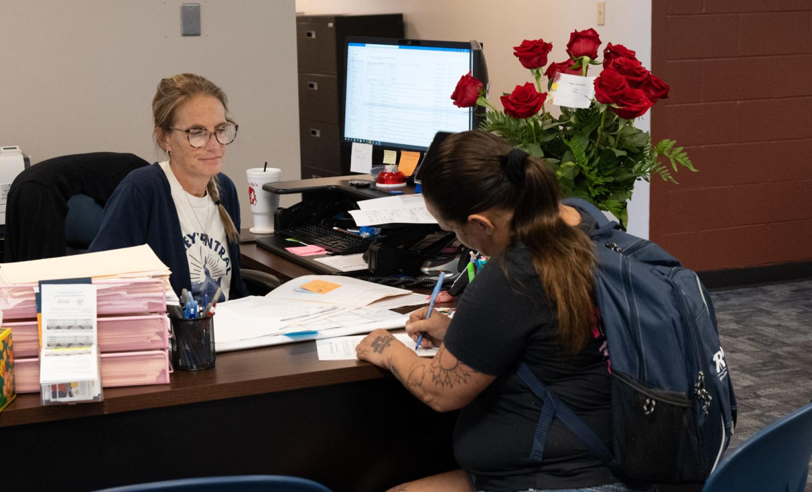 Student working with Financial Aid