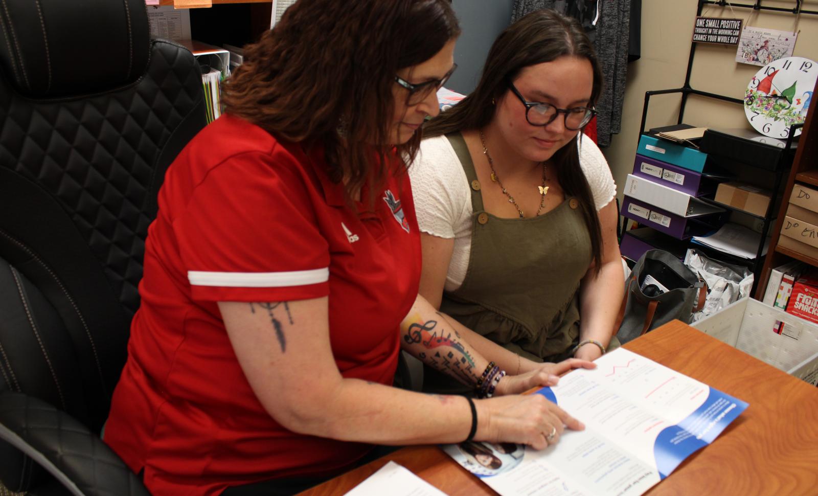 Advisor helping student