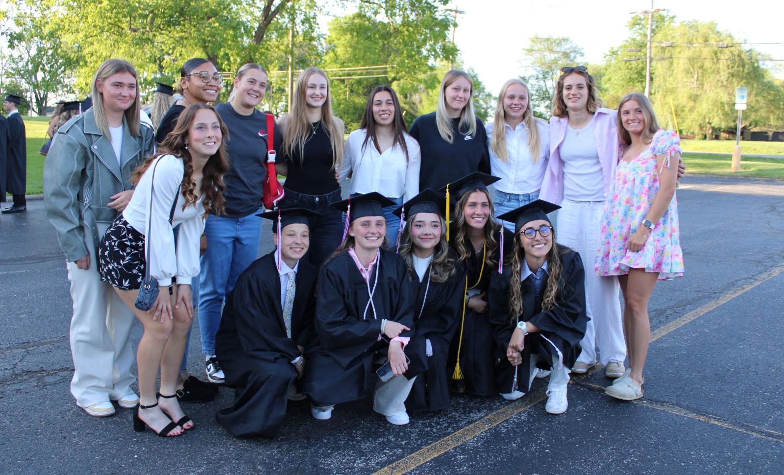 WVC graduates and friends pose in parking lot