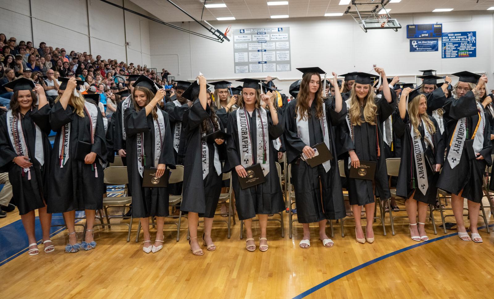 Graduates turning their tassel at graduation