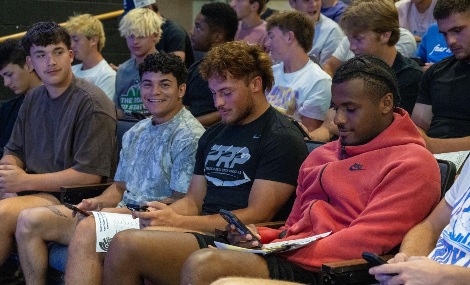 Students are sitting in the OCC Theater during New Student Orientation.