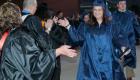 OCC Student Walking Through Graduation Line