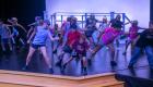 Students in Lincoln Trail College's production of Disney's Newsies JR. rehearse their choreography