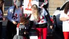 A Lincoln Trail College student hands out candy during Trunk or Treat at the Trail