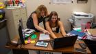 Resa Shaner, left, offers Haley Bricker advice during her internship with the Crawford County Development Association