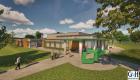 Architectural rendering of the future Lincoln Trail College Technology Center. The modern, single-story building features a mix of red brick and light-colored paneling, with large windows and a green-accented entrance canopy supported by columns. Students are depicted walking and talking along paved paths and sitting on benches in a landscaped area. A large green sculpture resembling the letters “LT” stands near the entrance.