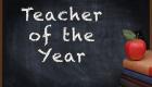 image of apple on top of books with text 'teacher of the year'